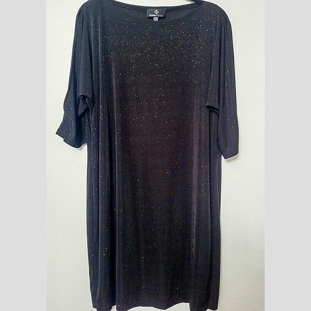 Women dazzle black dress.